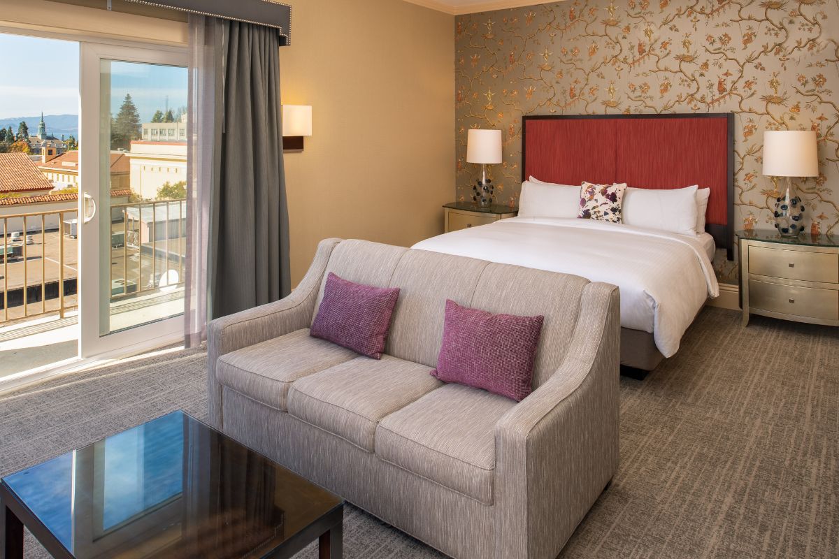 a room with a bed and couch