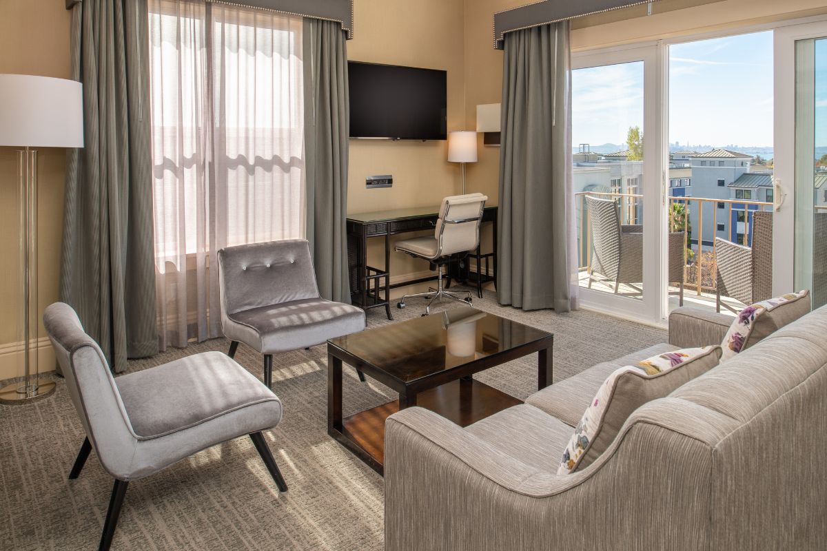a living room with a television and couches