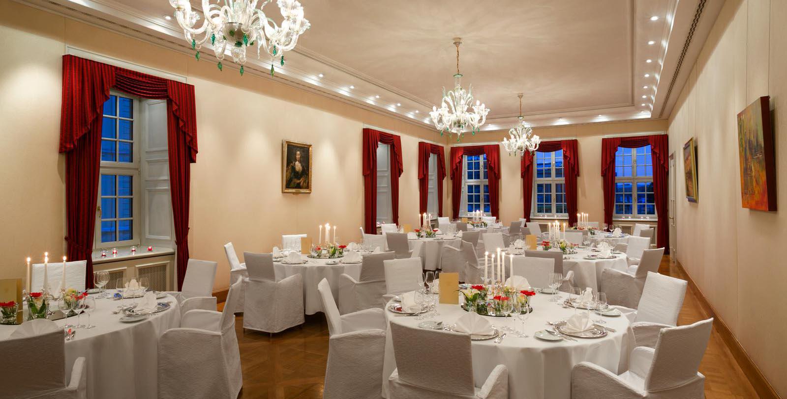 a room with tables and chairs