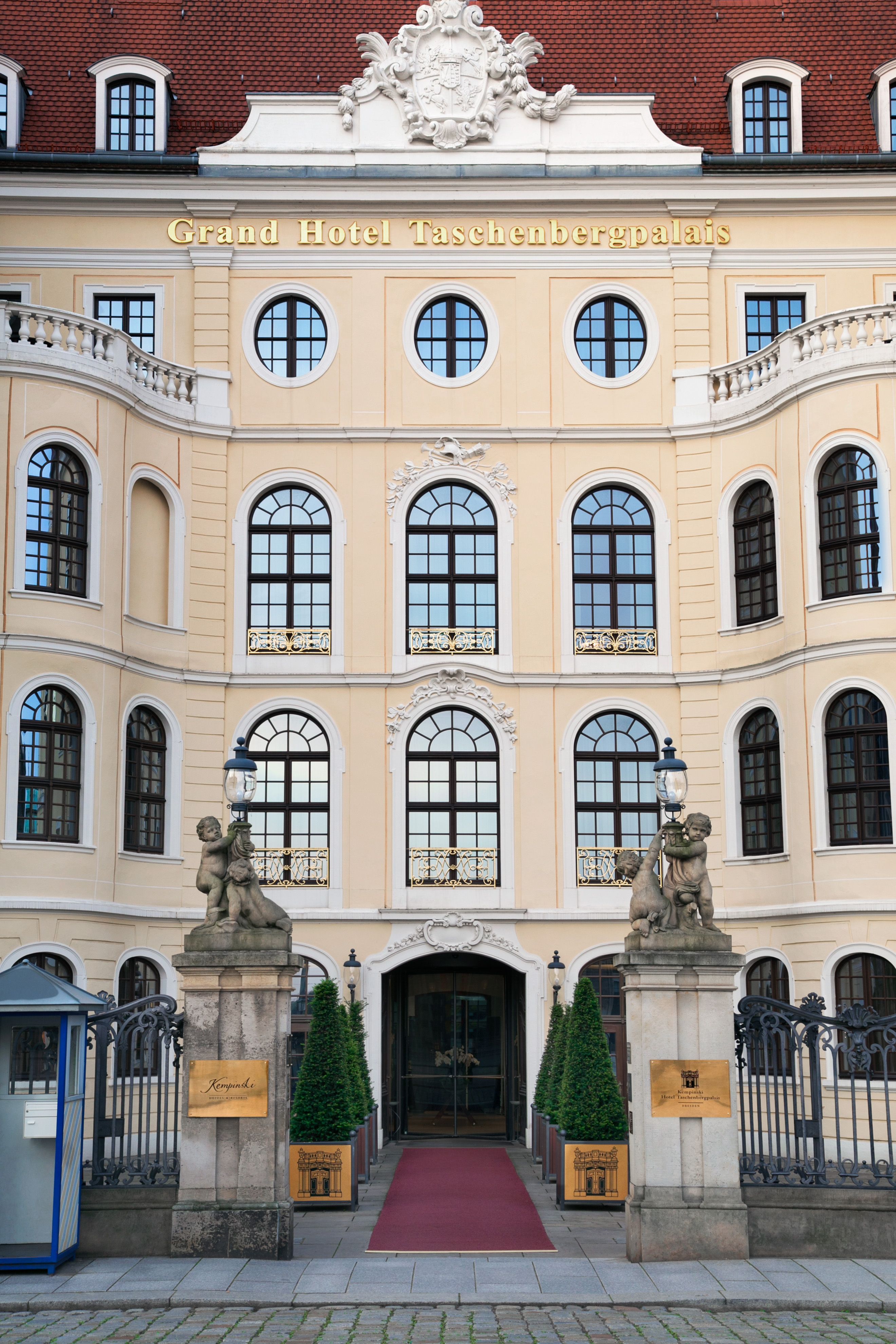 a building with statues in front of it