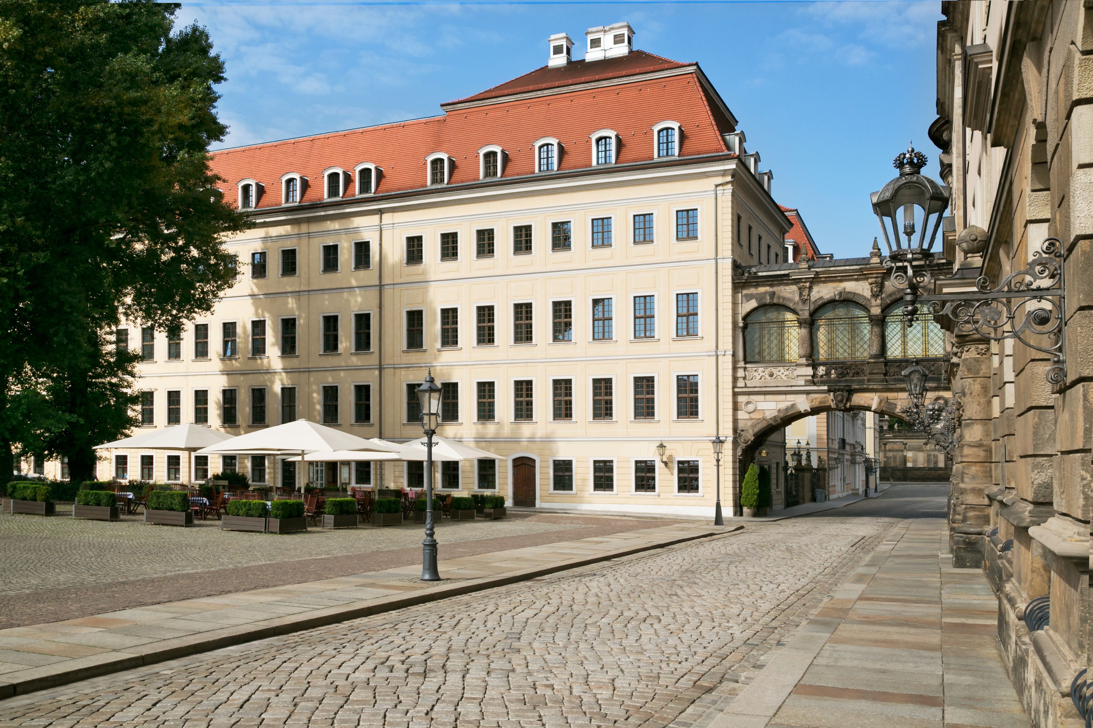 a building with a statue of a horse on the side