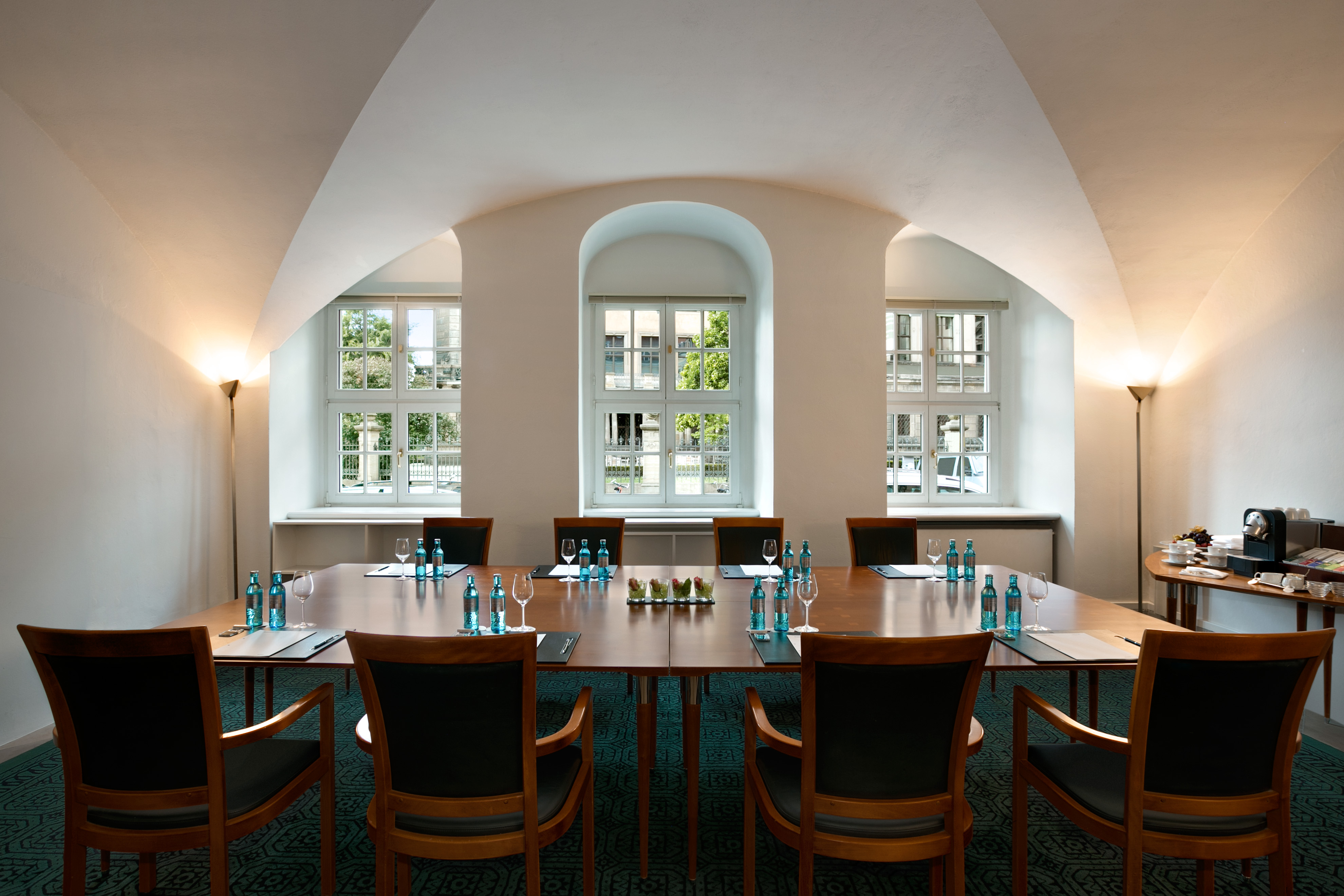 a room with a table and chairs