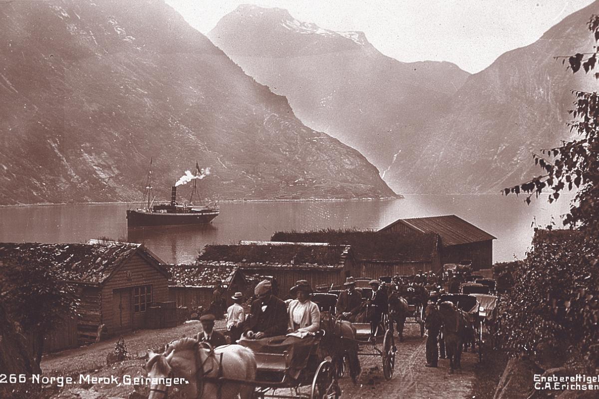 a group of people riding horses and carriages