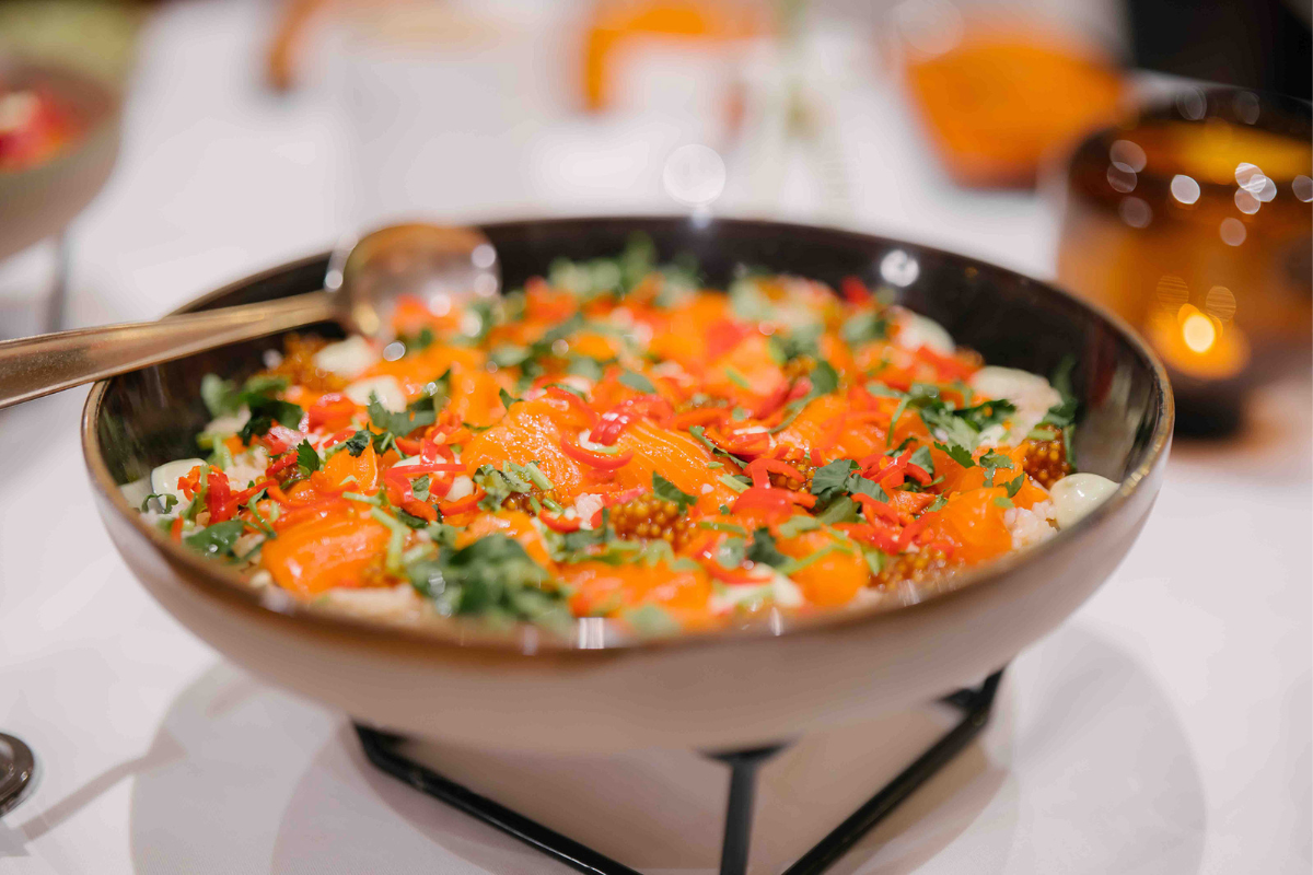 a bowl of food on a stand