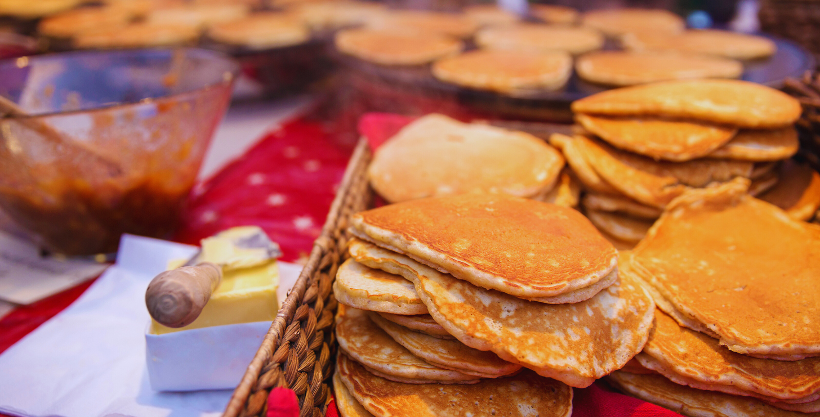 a stack of pancakes in baskets