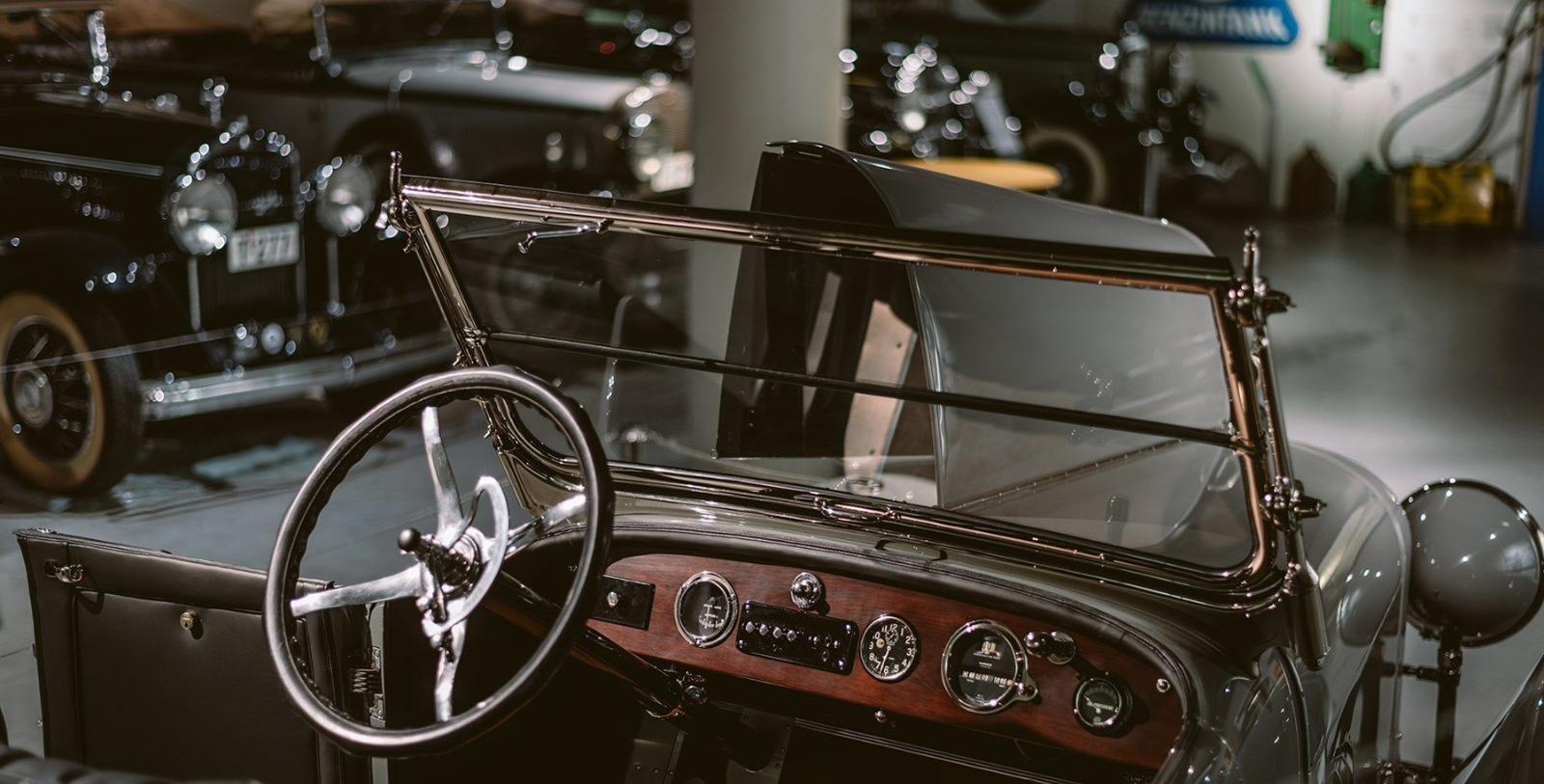 a steering wheel and dashboard of a car