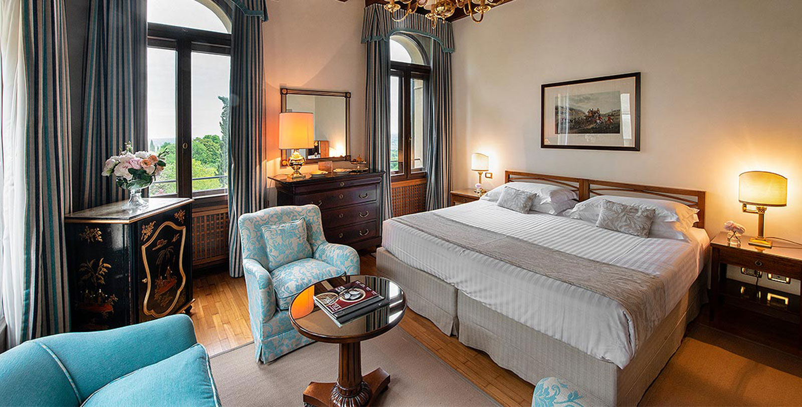 a bedroom with a bed and a table