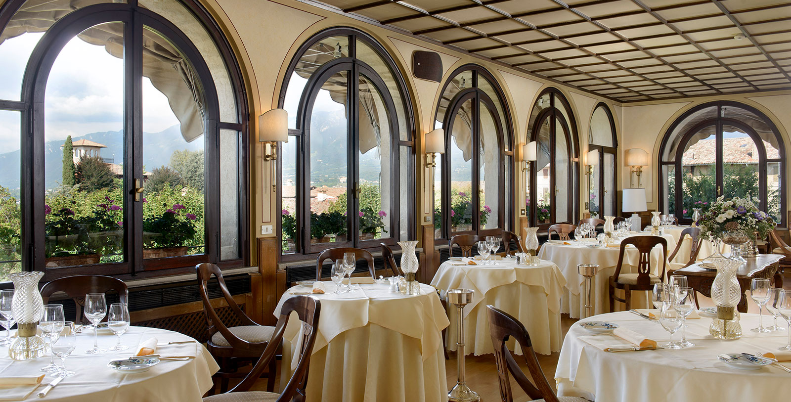 a restaurant with tables and chairs