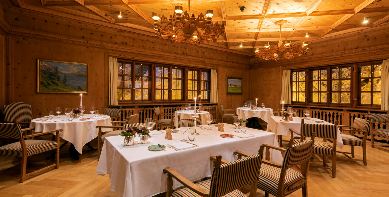 a room with tables and chairs