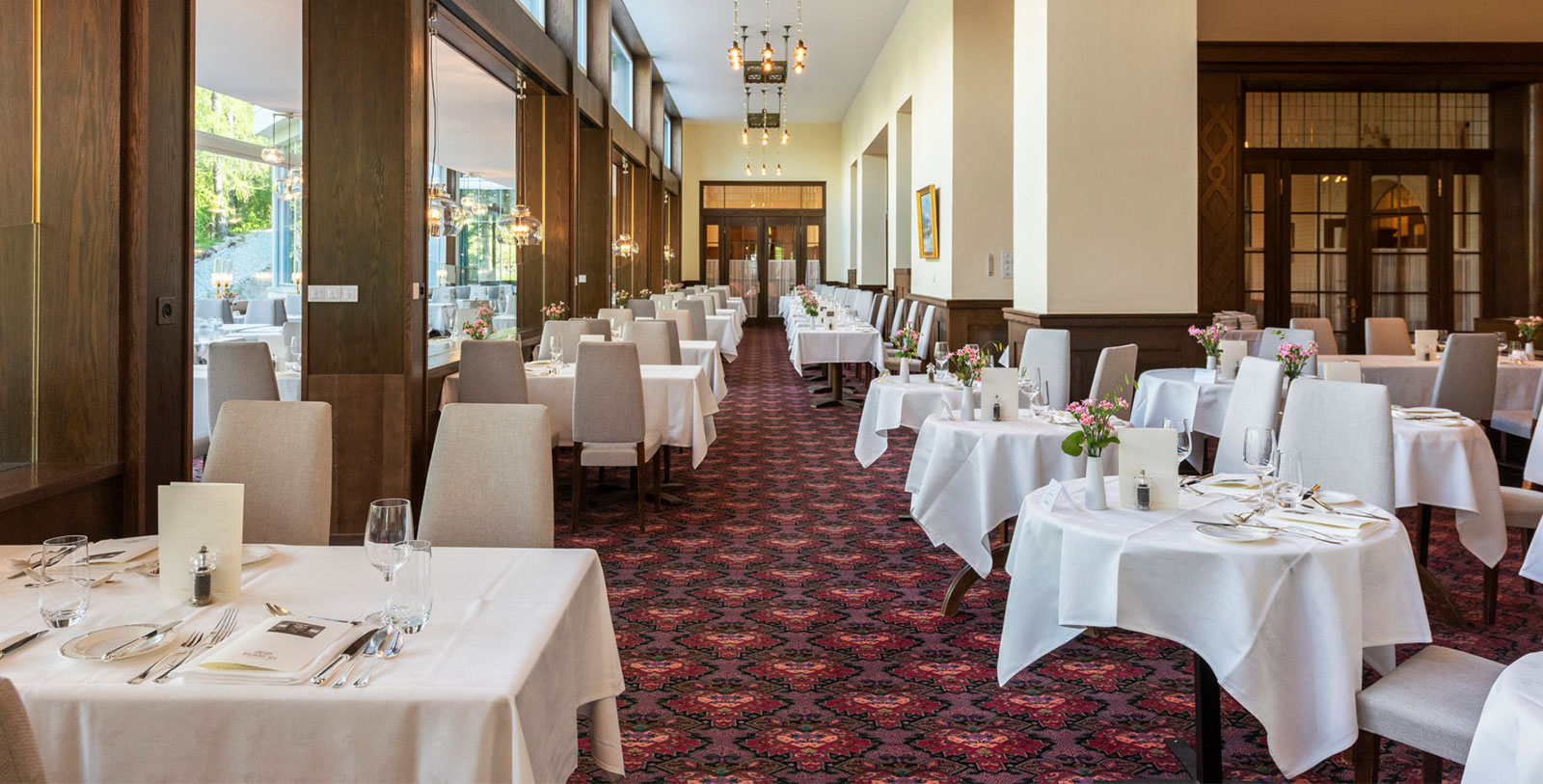 a room with tables and chairs