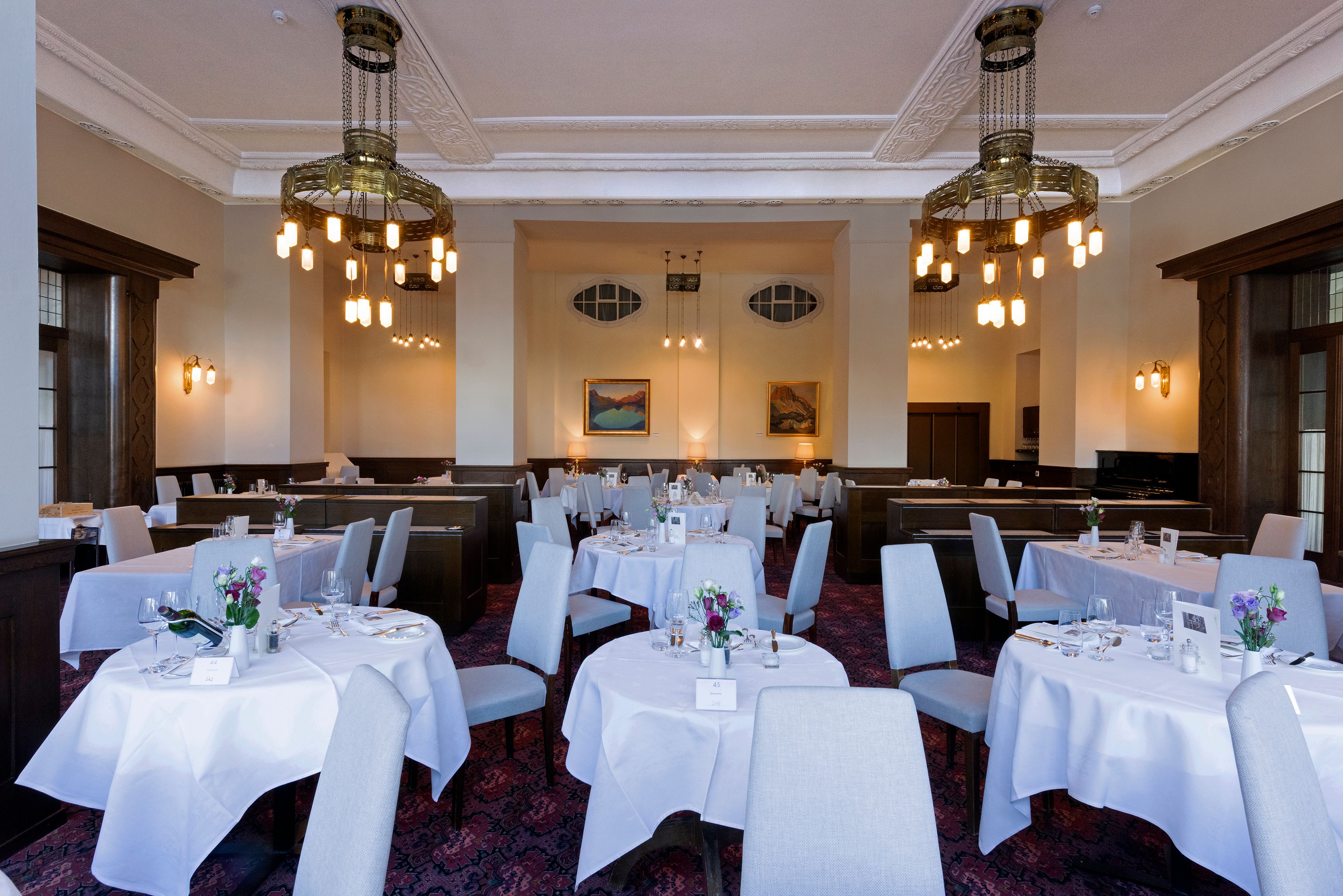 a room with tables and chairs
