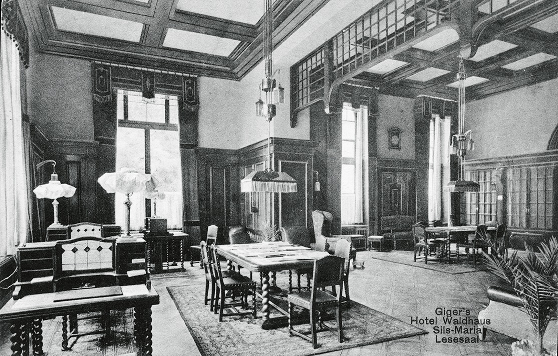 a room with a table and chairs