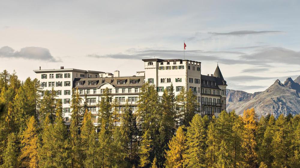 a large building surrounded by trees