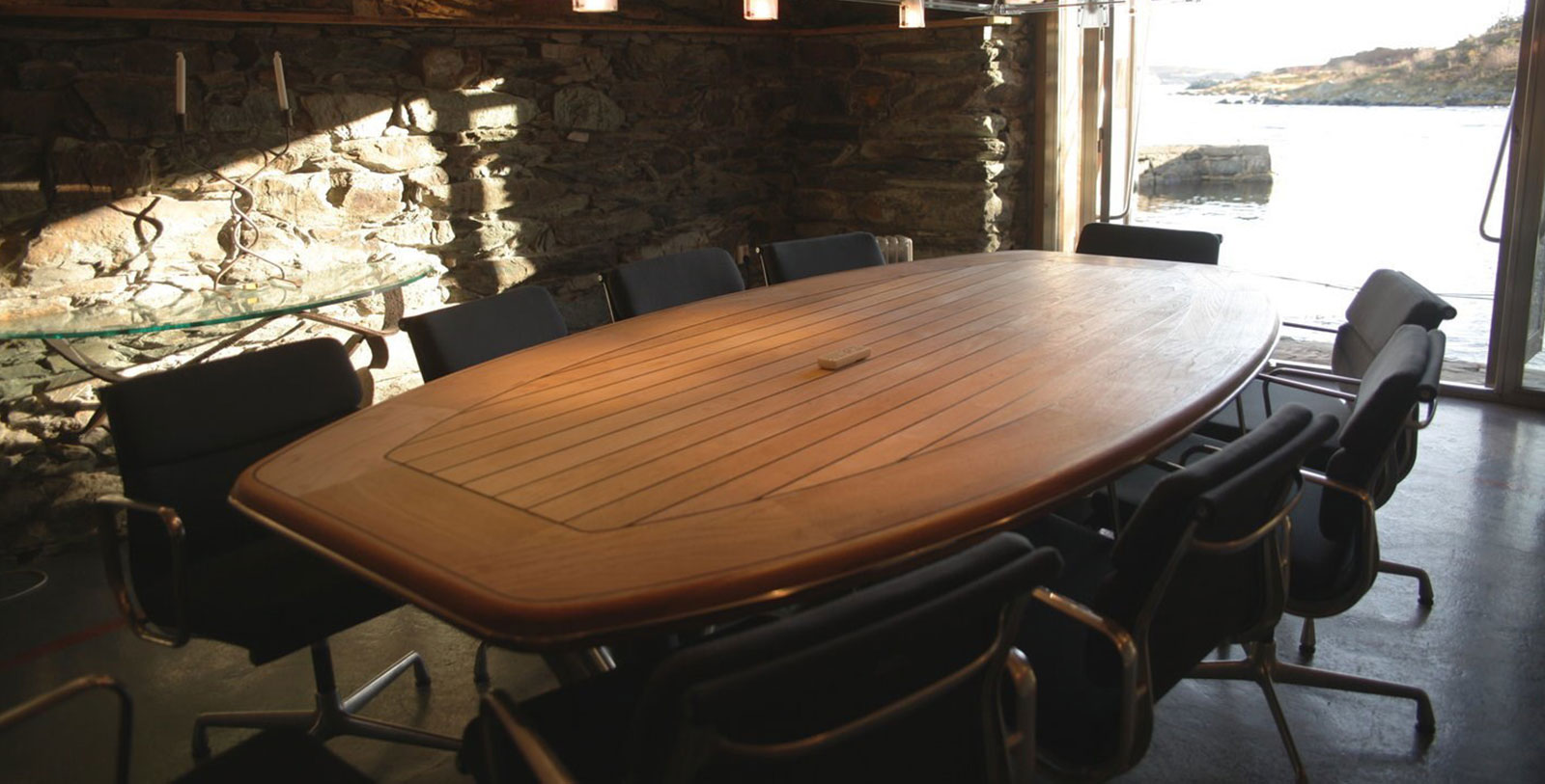 a table with chairs in a room