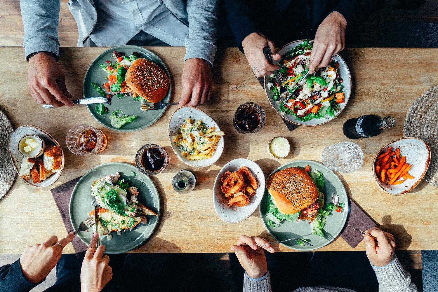 a group of people eating at a table