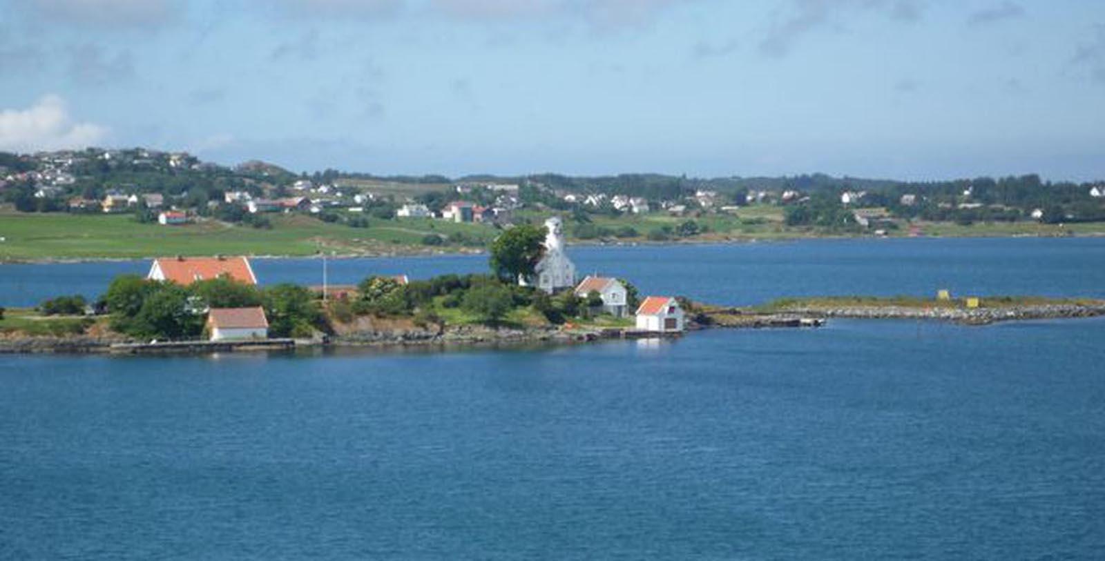 a small island with a building on it