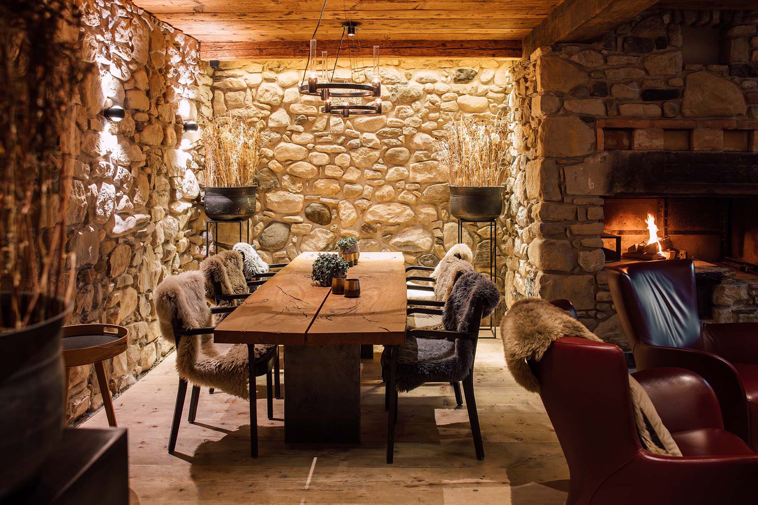 a room with a table and chairs