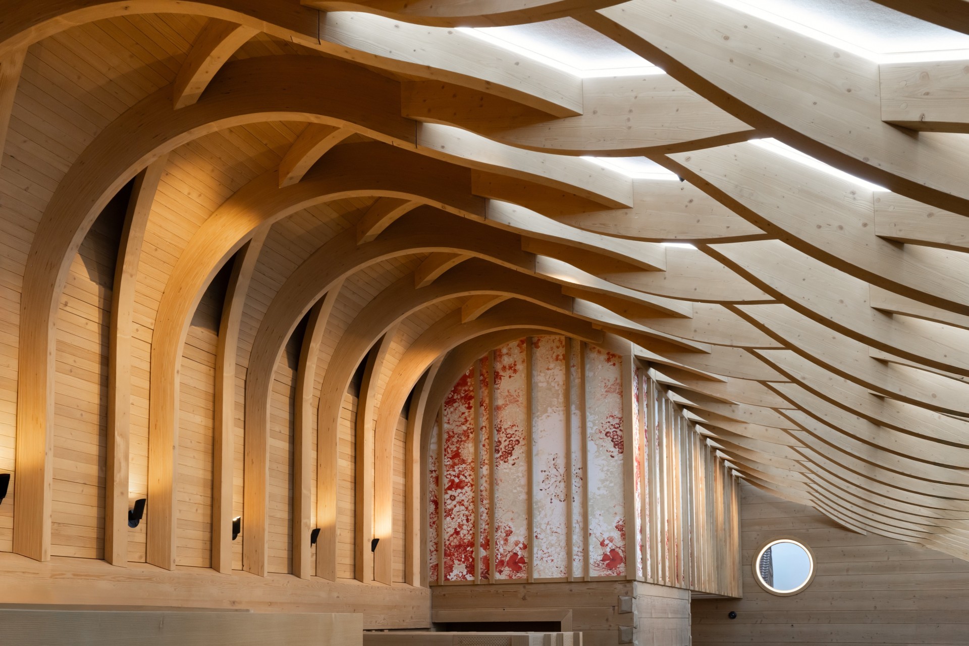 a wooden ceiling with curved wood panels