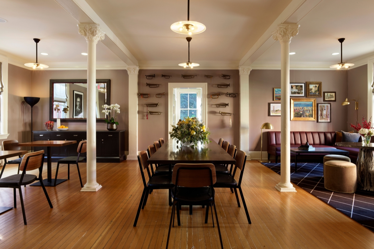 a dining room with a table and chairs