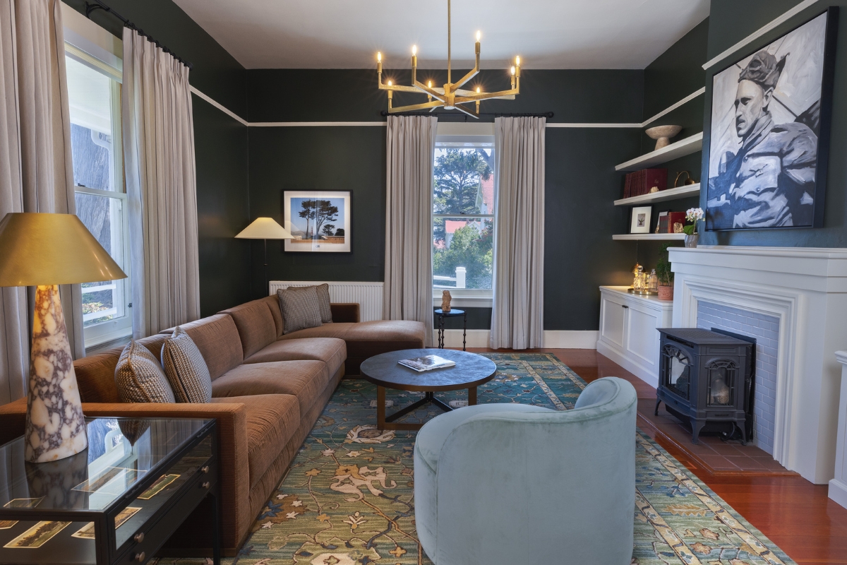 a living room with a couch and a rug