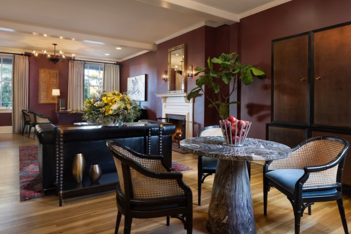 a room with a table and chairs