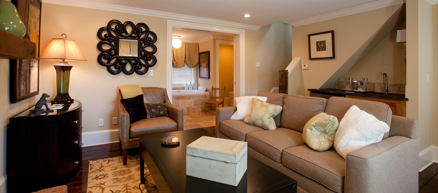 a living room with couches and a coffee table