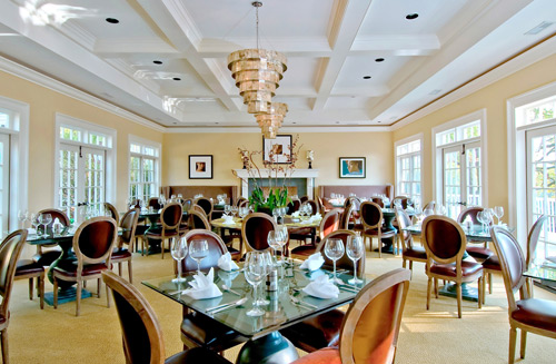 a restaurant with many tables and chairs