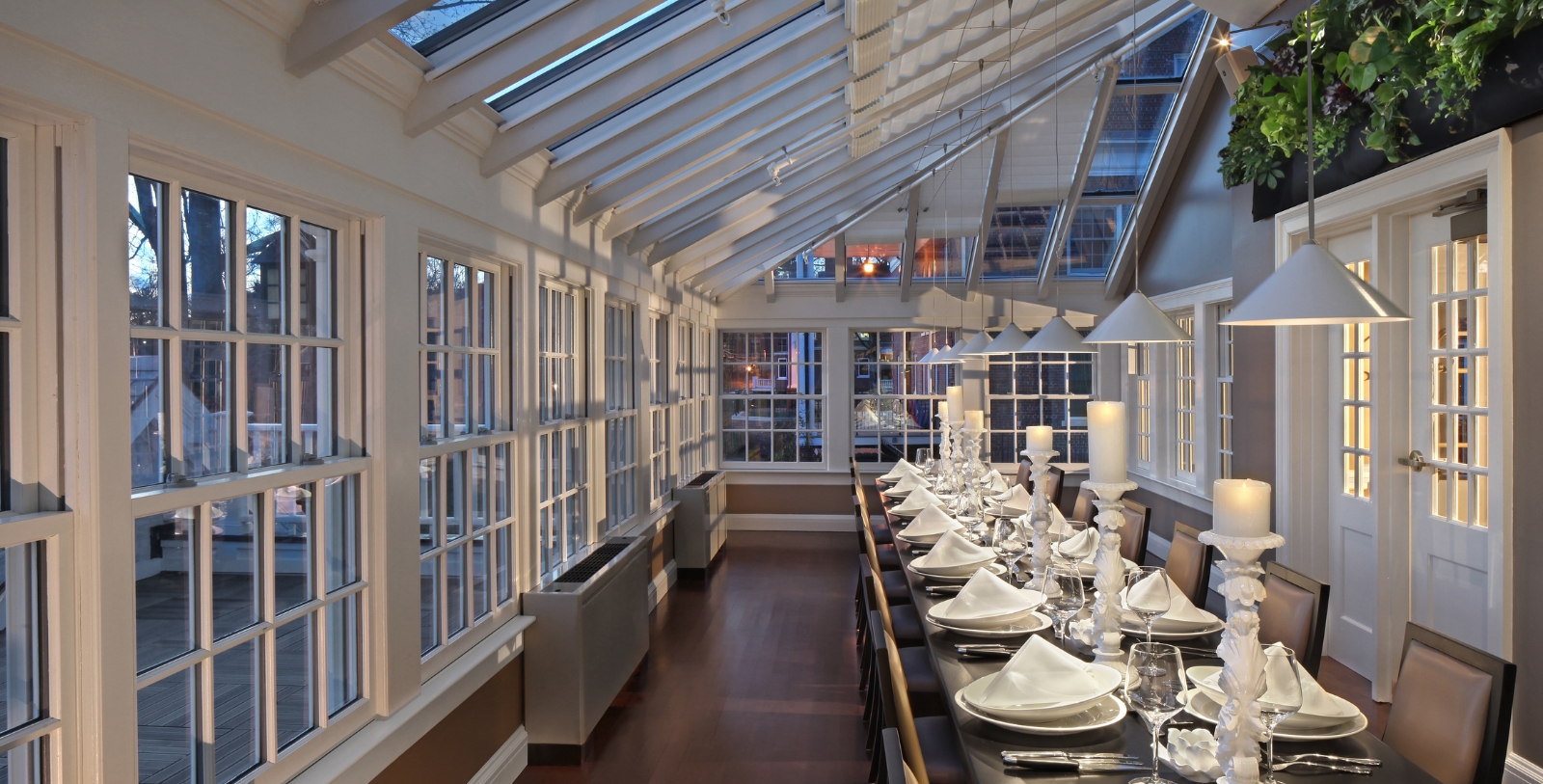 a long table with plates and plates on it