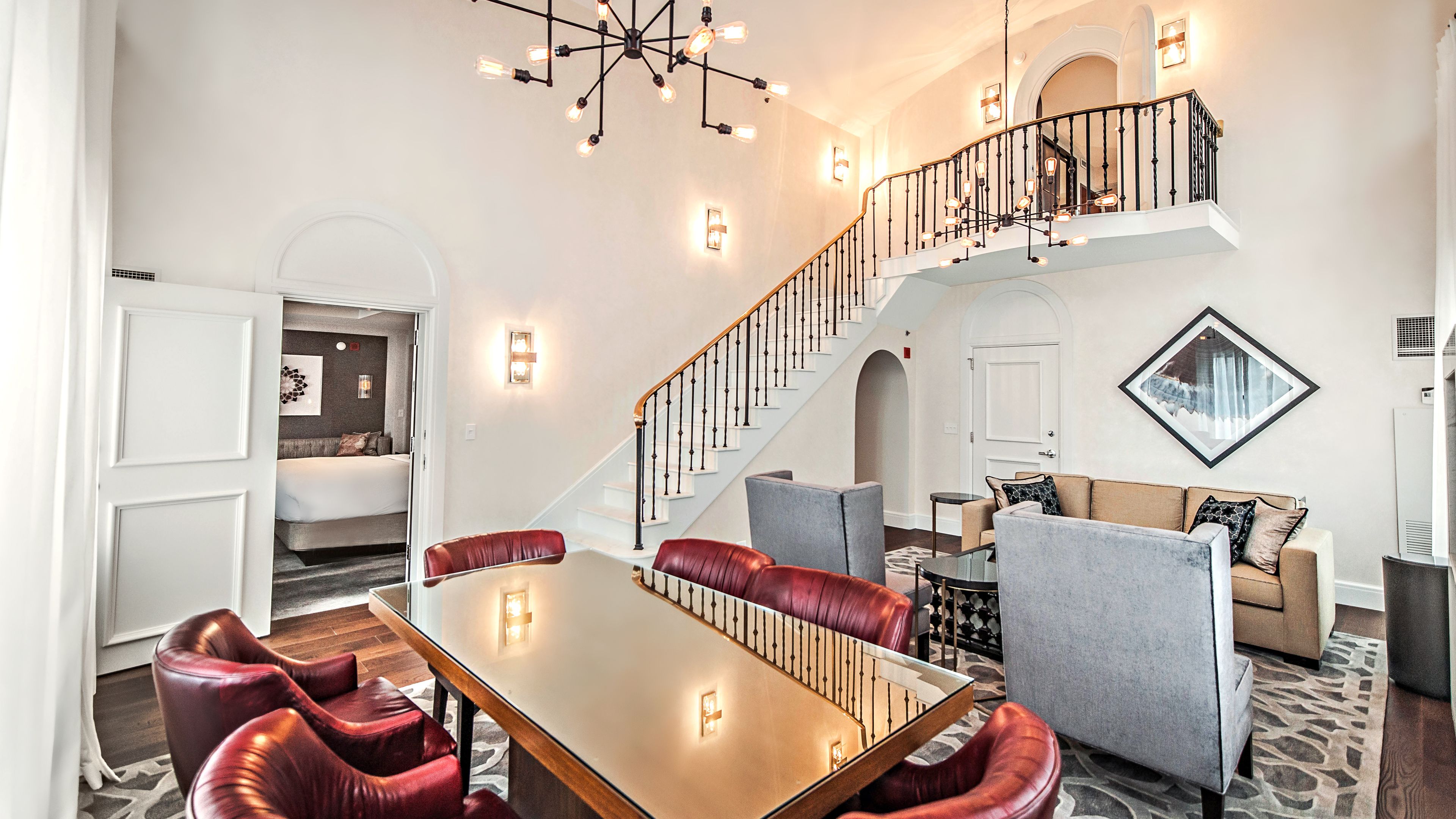 a room with a table and chairs