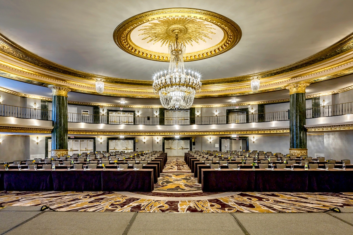 a large room with tables and chairs