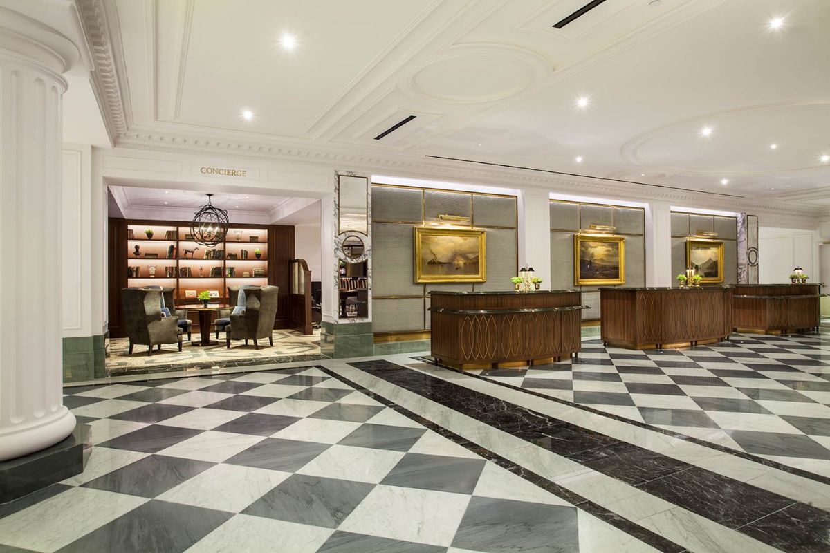a large room with a checkered floor and a black and white floor
