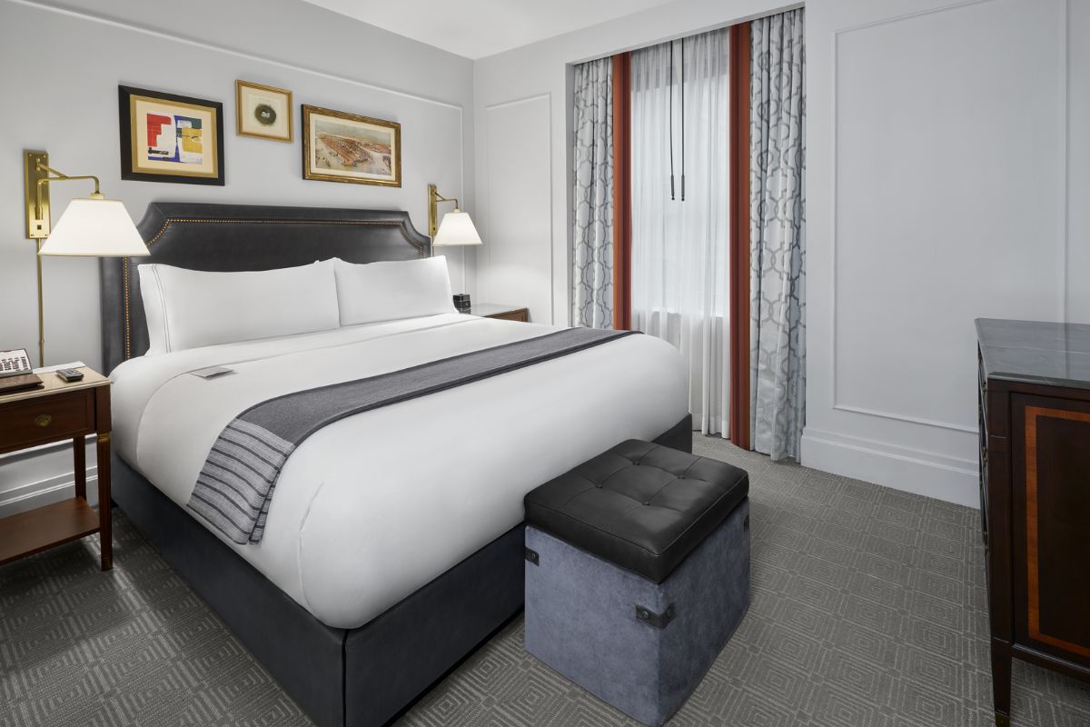 a bed in a hotel room