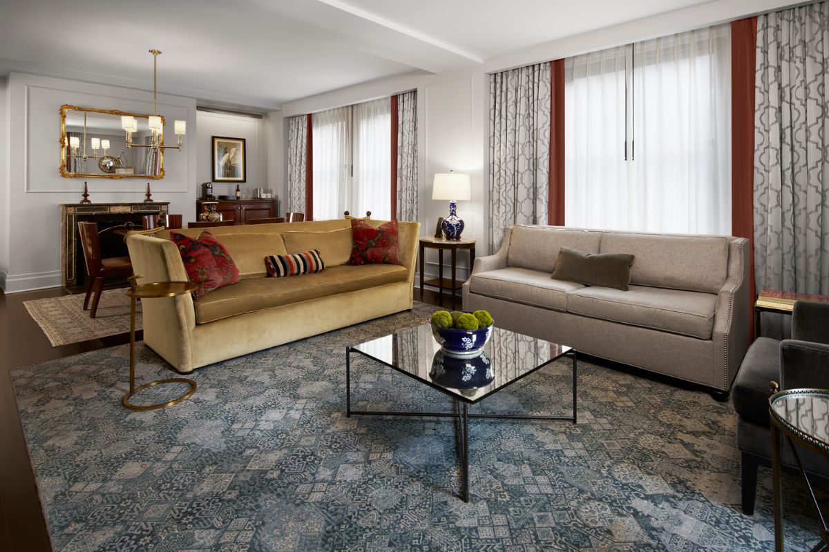 a living room with couches and a coffee table