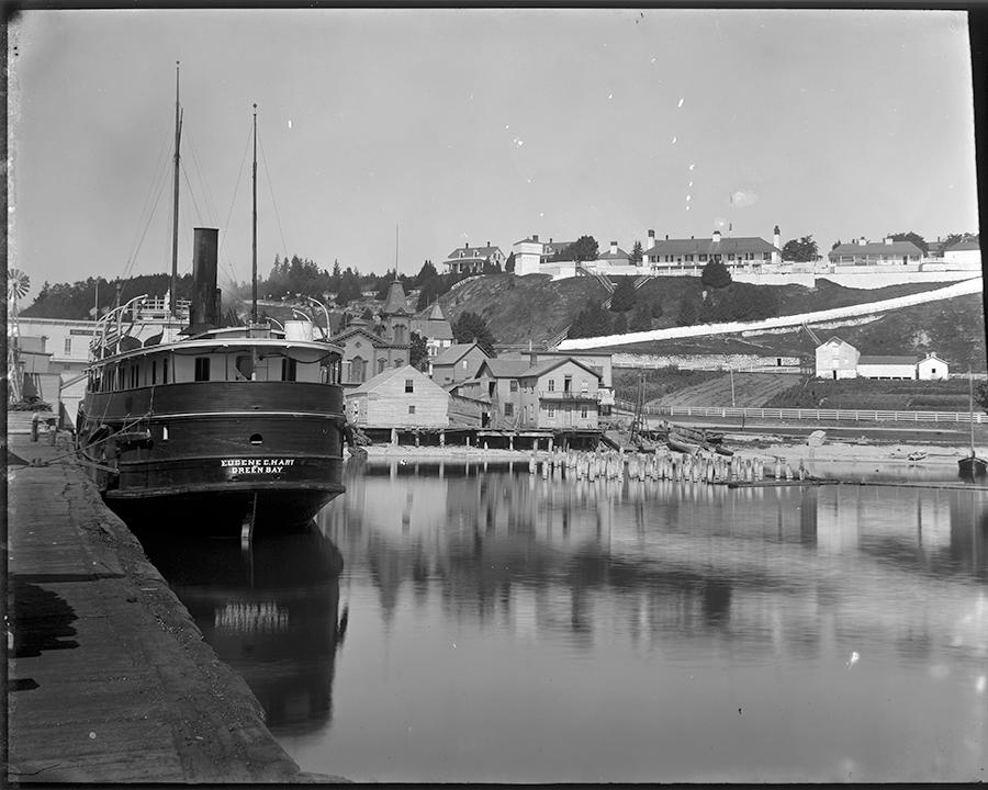 a boat docked at a dock