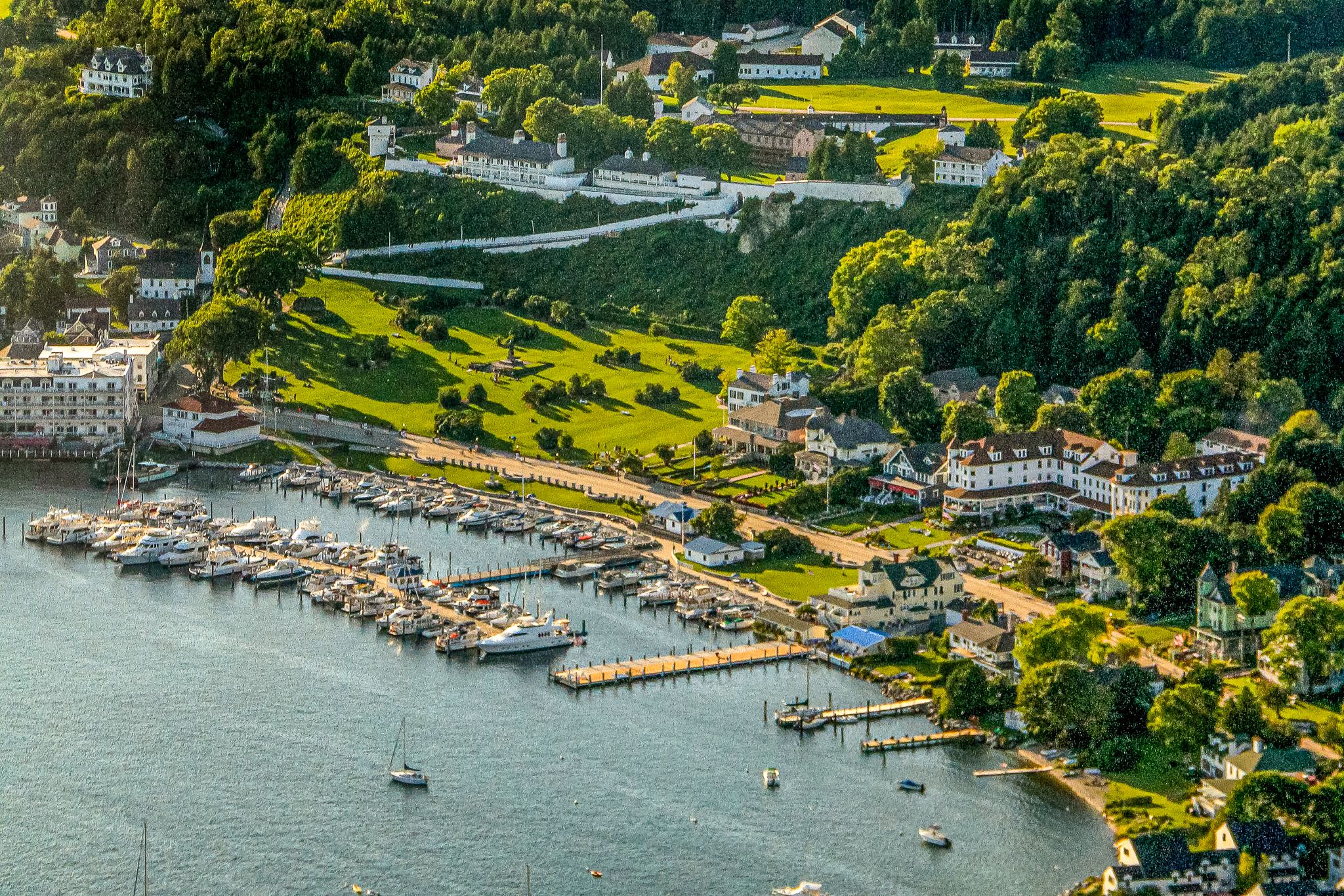 a aerial view of a harbor with boats and buildings