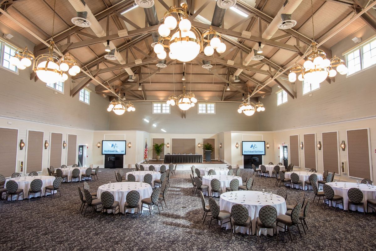 a large room with tables and chairs