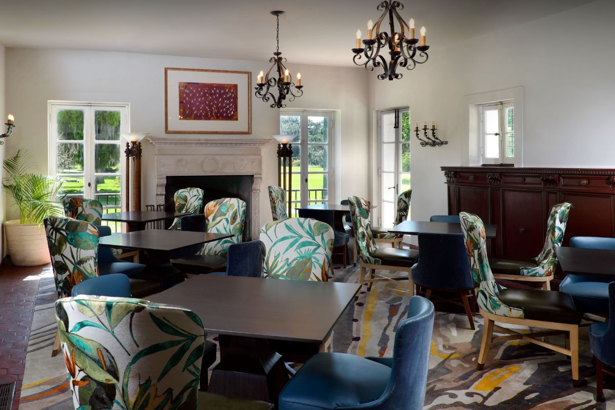 a room with tables and chairs