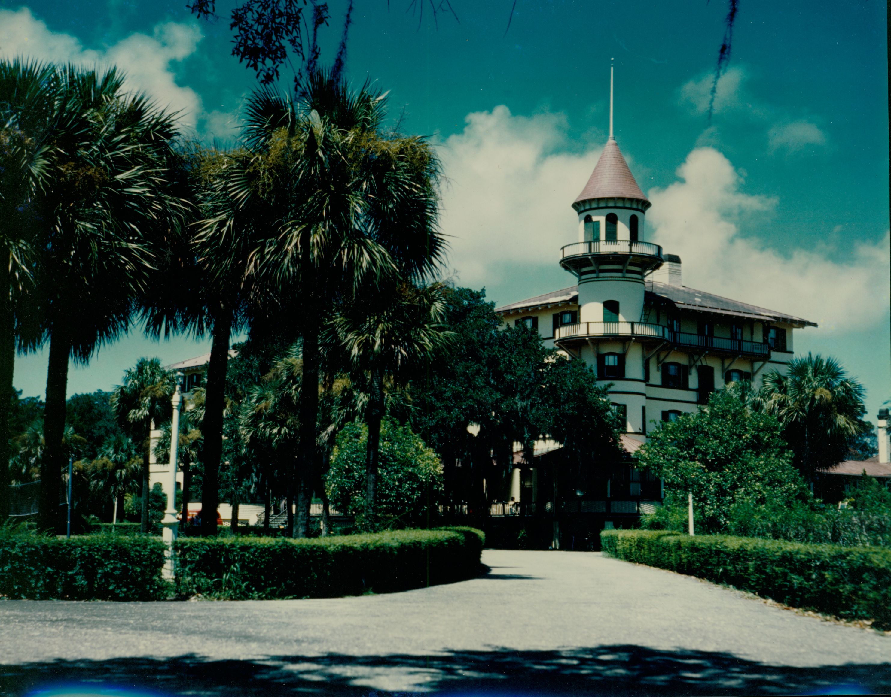 a building with a tower and a walkway