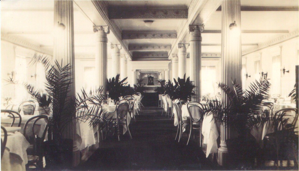 a room with tables and chairs