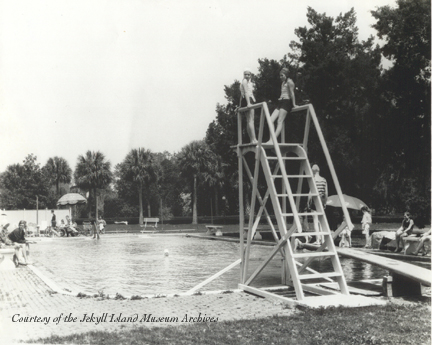 a group of people on a lifeguard tower