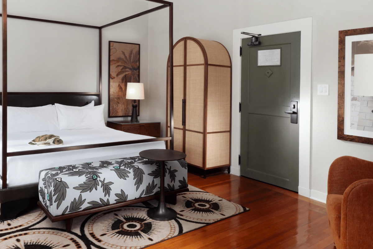 a room with a bed and a door
