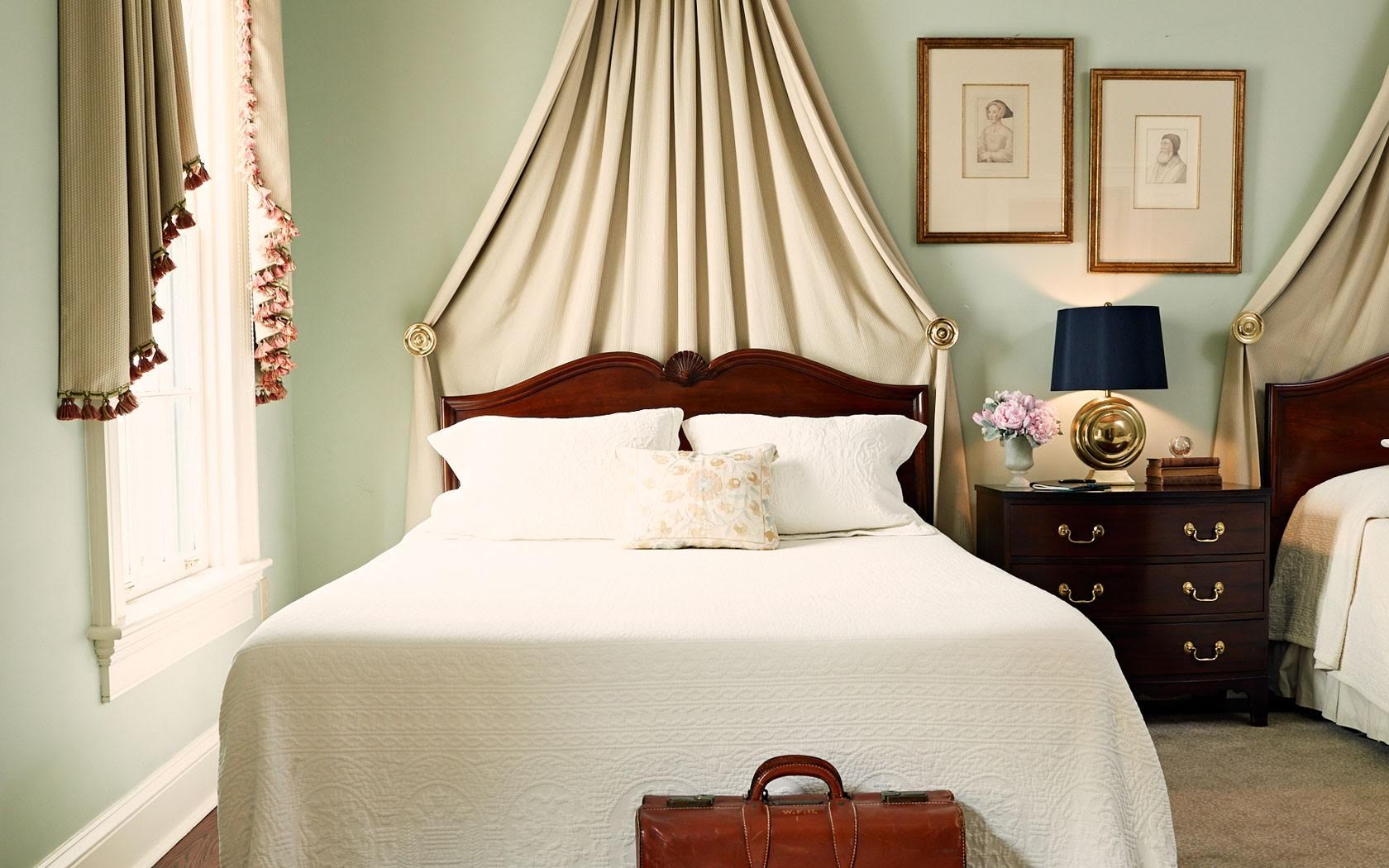a bed with a canopy over it