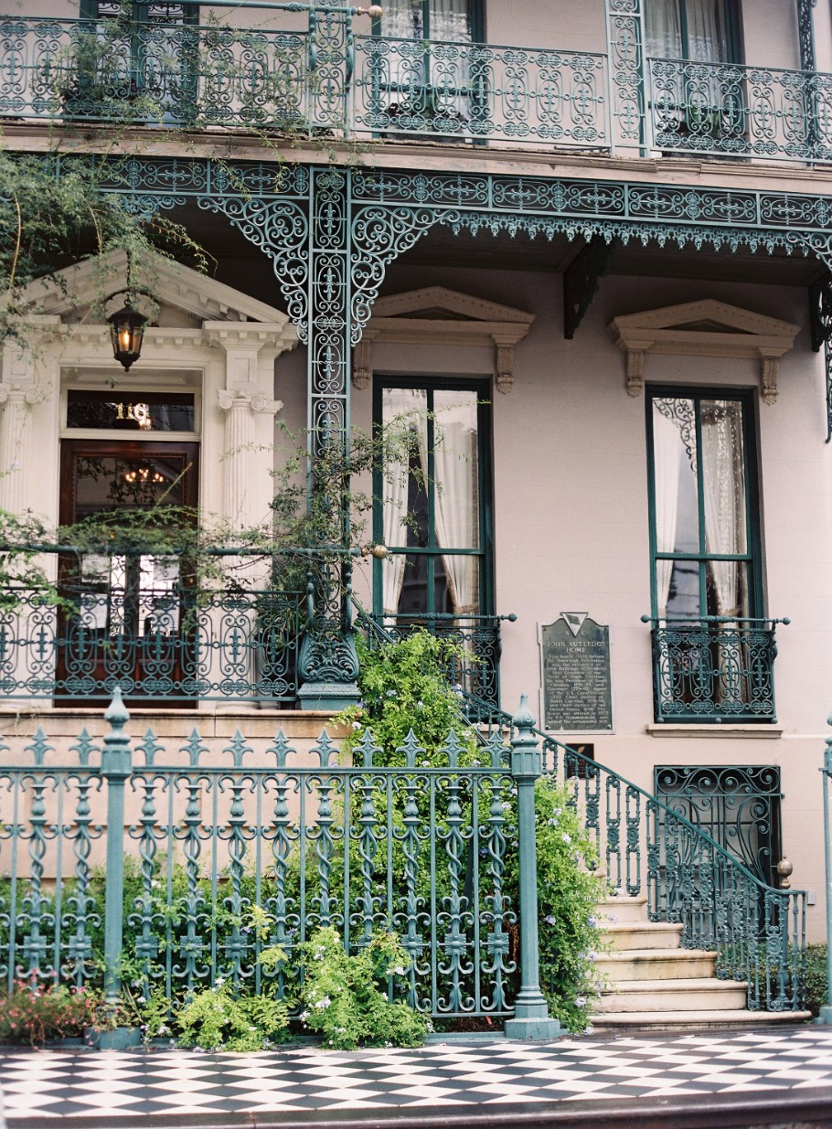 a house with a fence and a gate