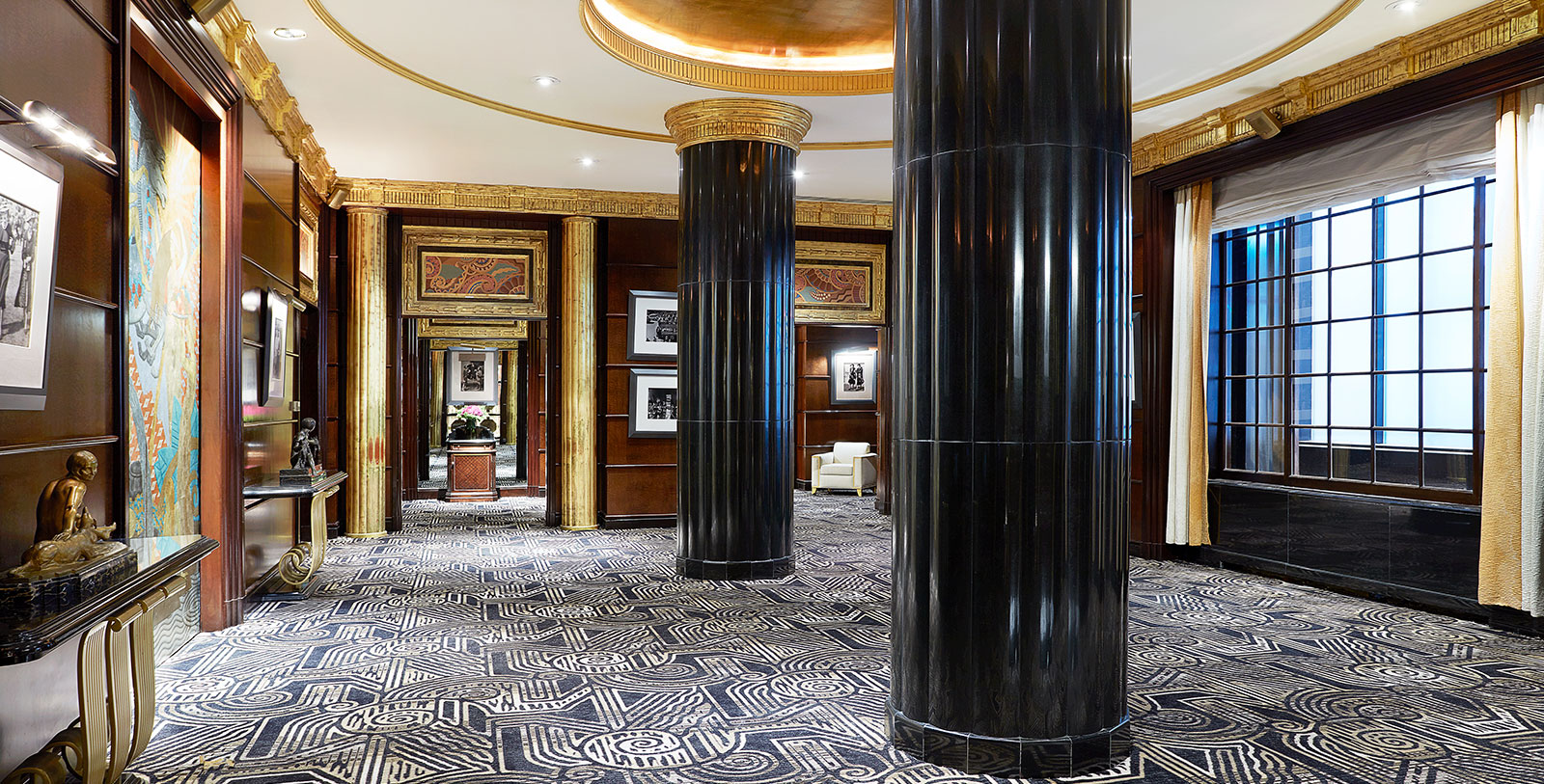 a large black columns in a room
