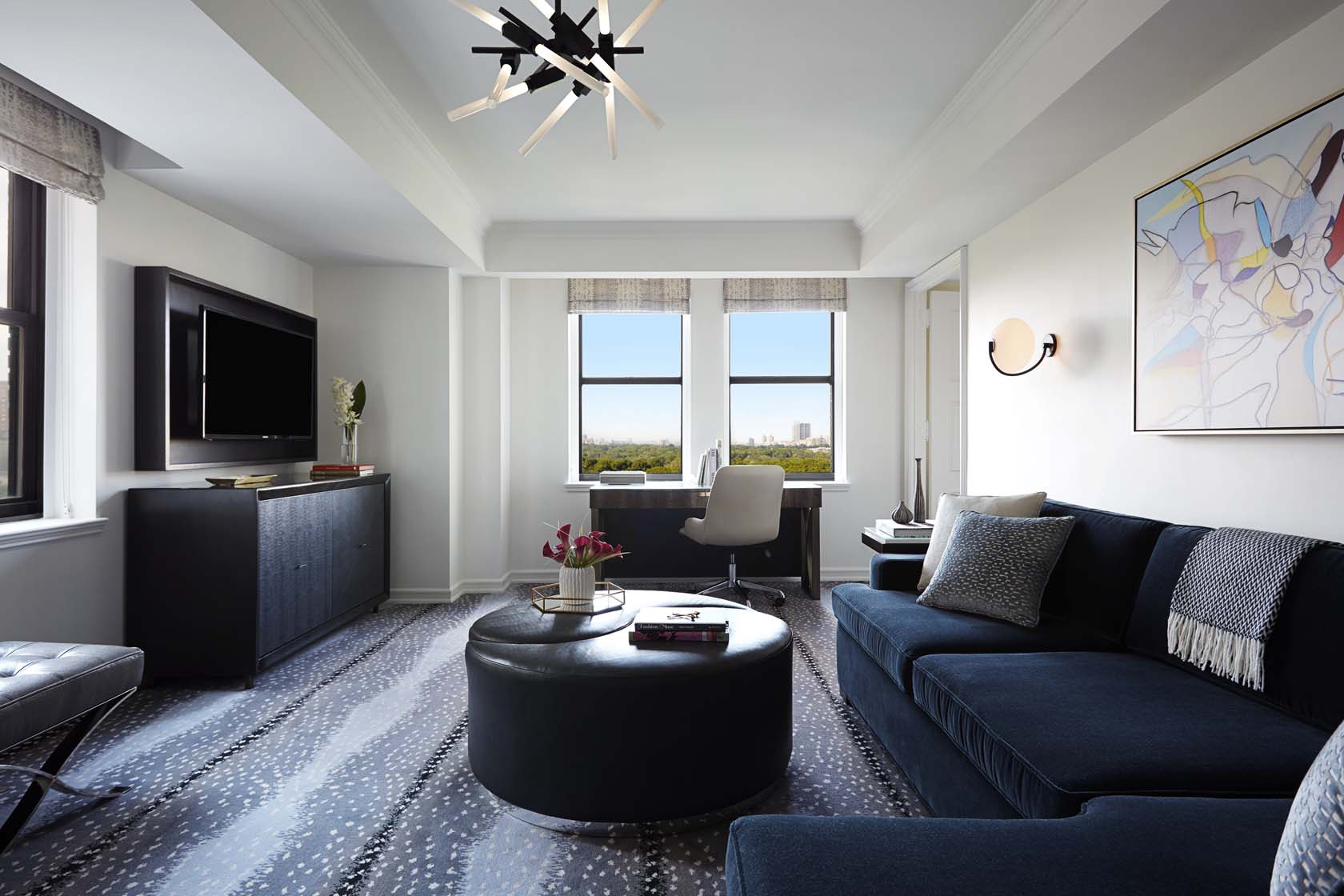 a living room with a couch and a table