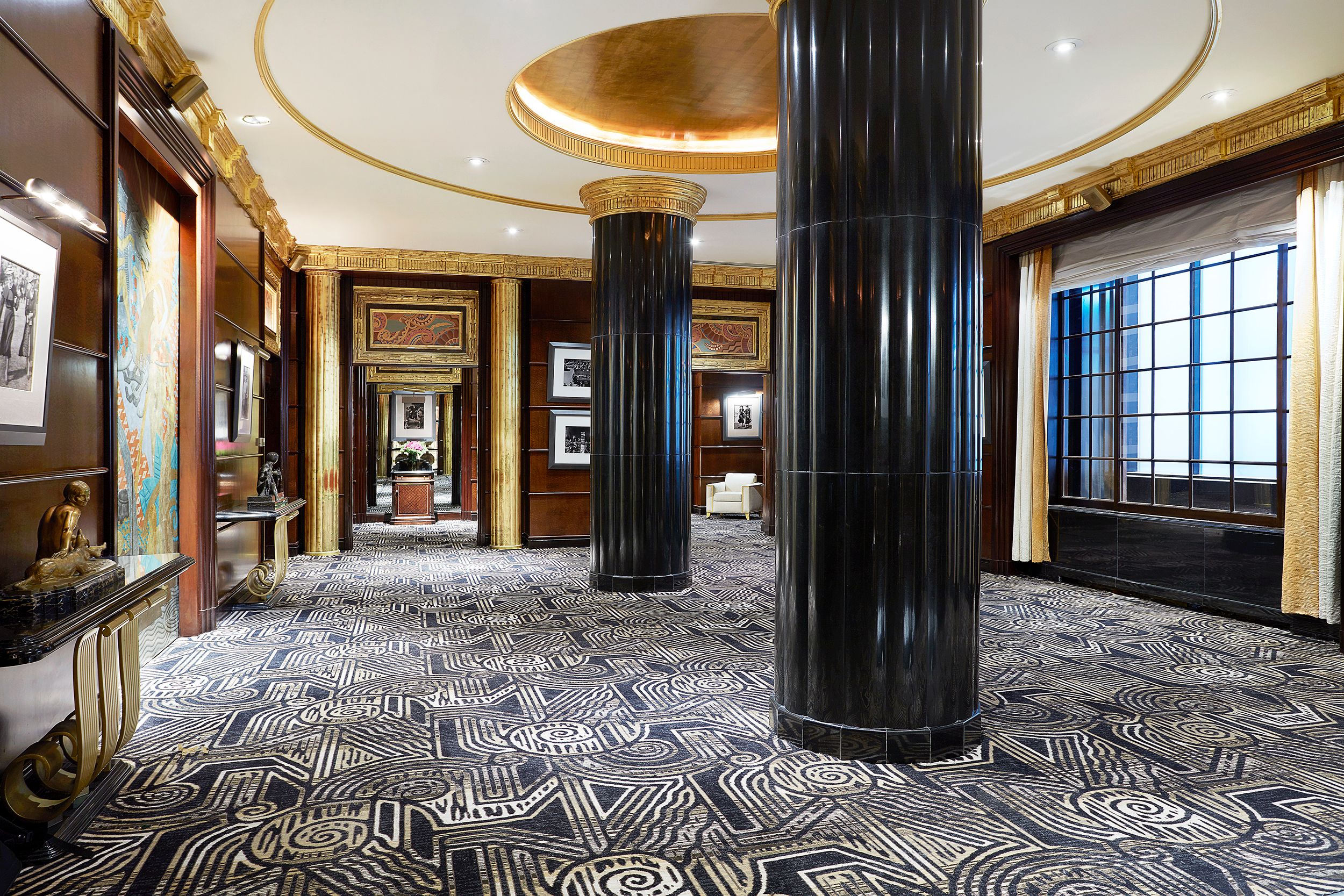 a large black columns in a room