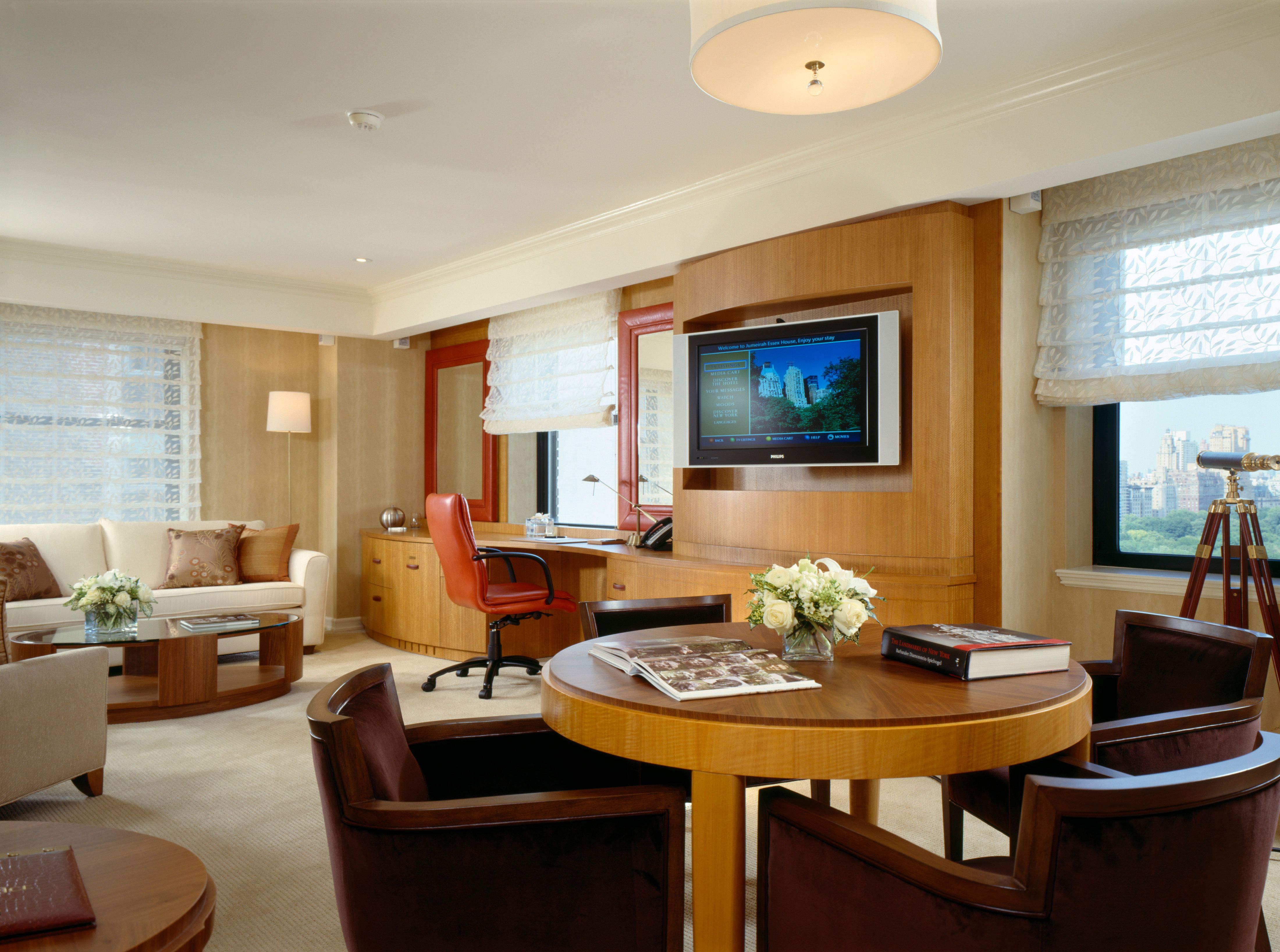 a room with a television and a table