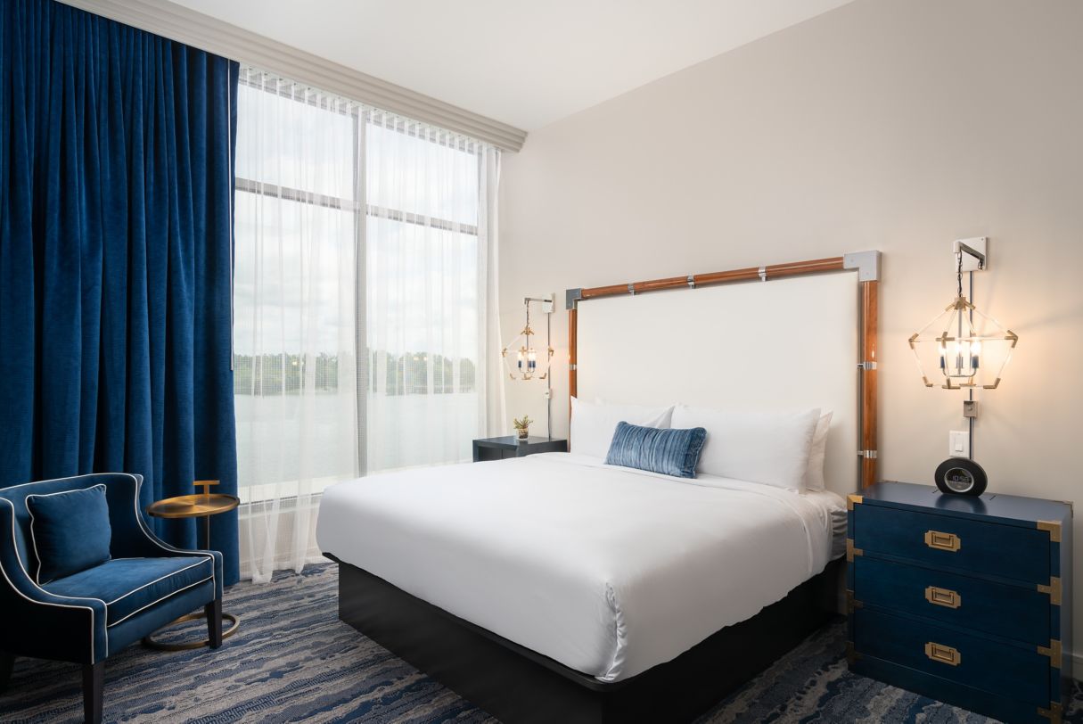a room with a bed and a window