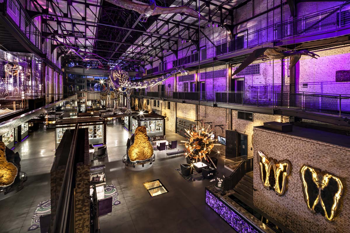 a large room with purple lights