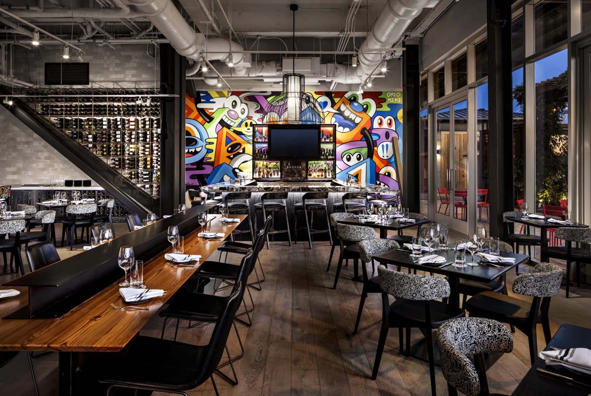a restaurant with tables and chairs
